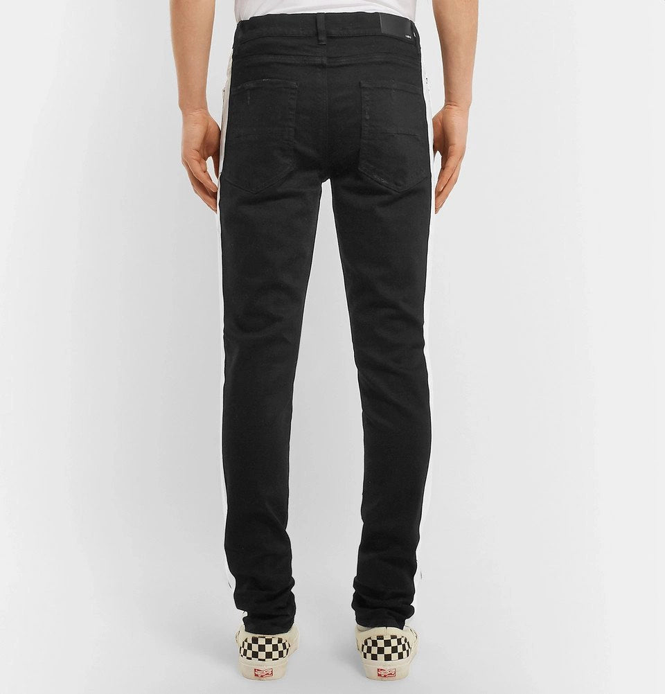 AMIRI - Track Skinny-Fit Striped Distressed Stretch-Denim Jeans - Men - Black