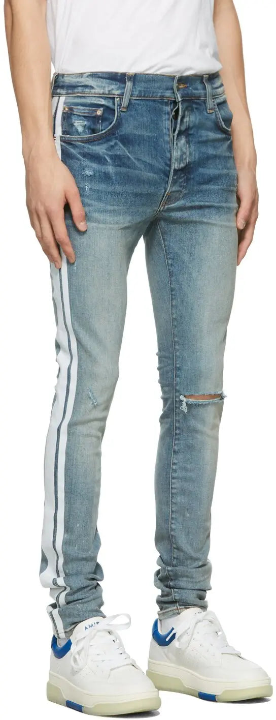 amiri  blue flocked track jeans