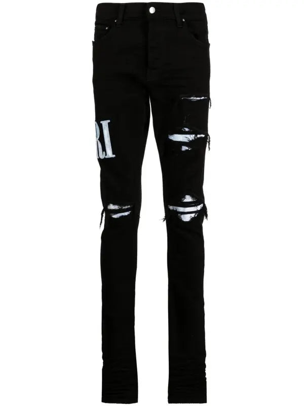 amiri  tie dye core distressed skinny jeans