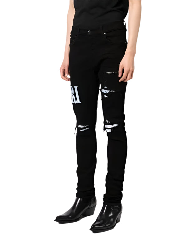 amiri  tie dye core distressed skinny jeans
