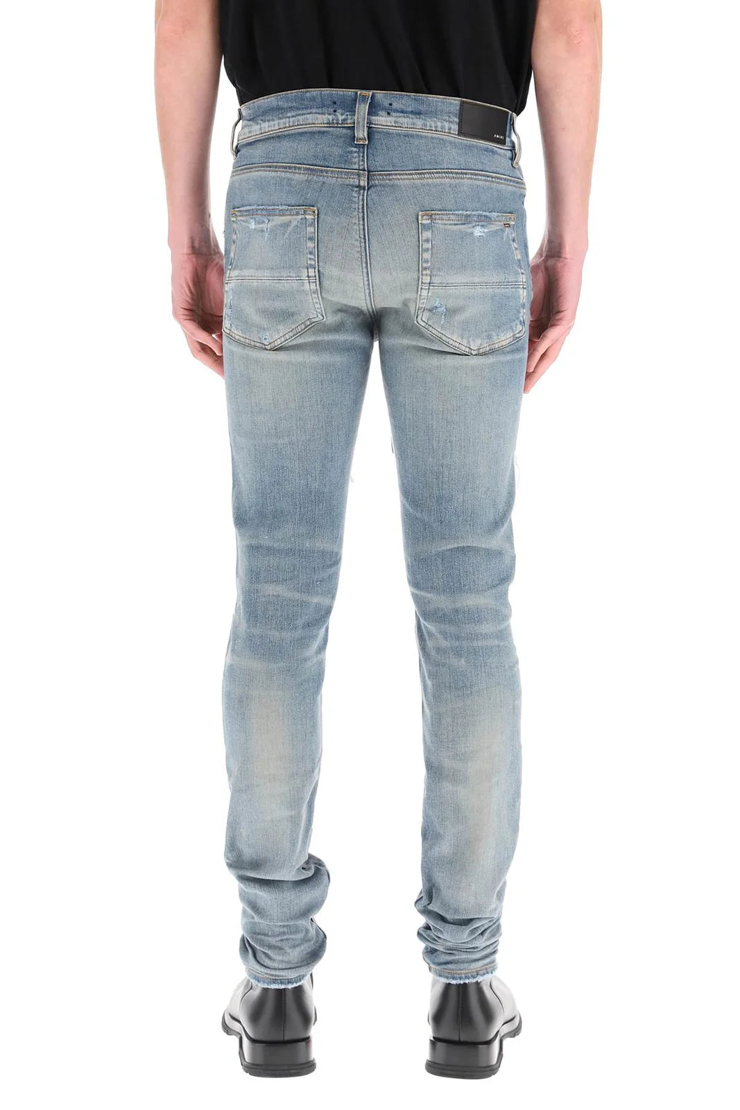 Amiri Logo Patch Distressed Slim-Cut Jeans